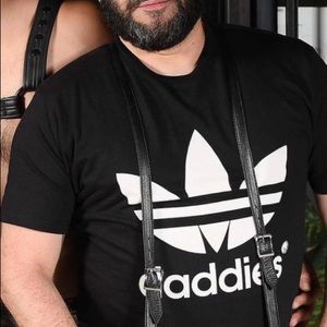 *Cool! - Used - Black T-Shirt with the word: (daddies) in white on the front.